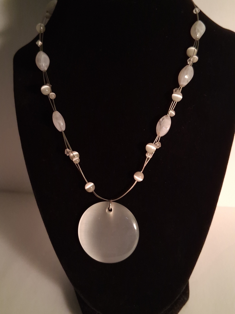 Elegant White Pendant Necklace with Beaded Accents